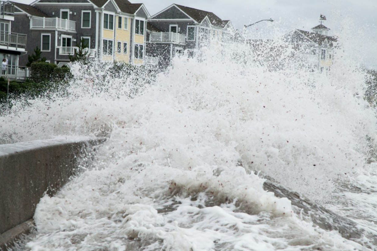 Waves hitting houses on CT coast